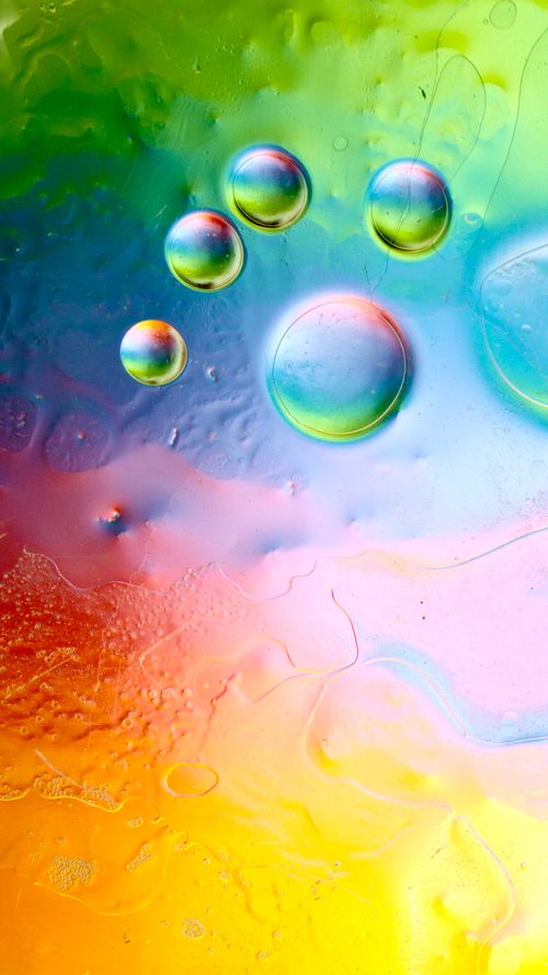 Free Colorful bubbles with a vivid, abstract background, perfect for creative projects. Stock Photo