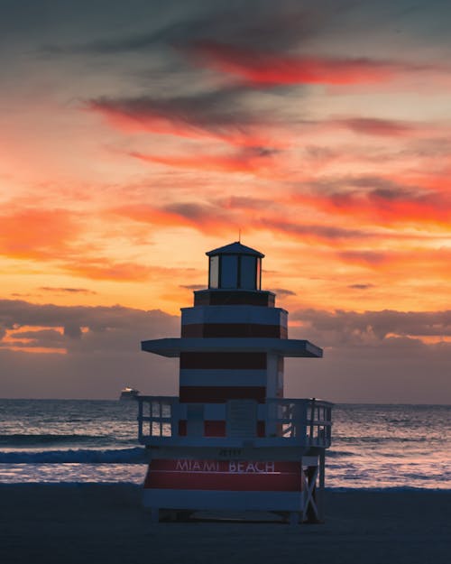 Free Lifeguard Tower During Sunset Stock Photo