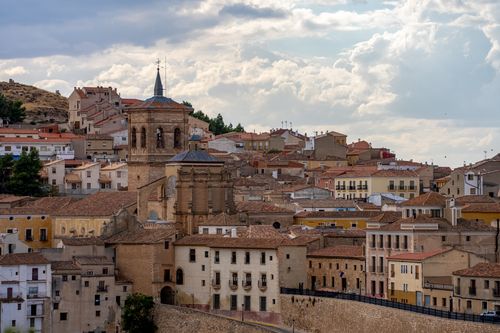 Free A beautiful view of Chinchilla de Montearagón with historic architecture and vibrant rooftops. Stock Photo
