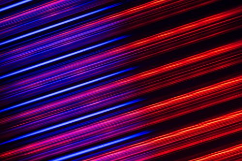 Free Dynamic abstract image featuring vibrant neon lines creating a futuristic art design. Stock Photo