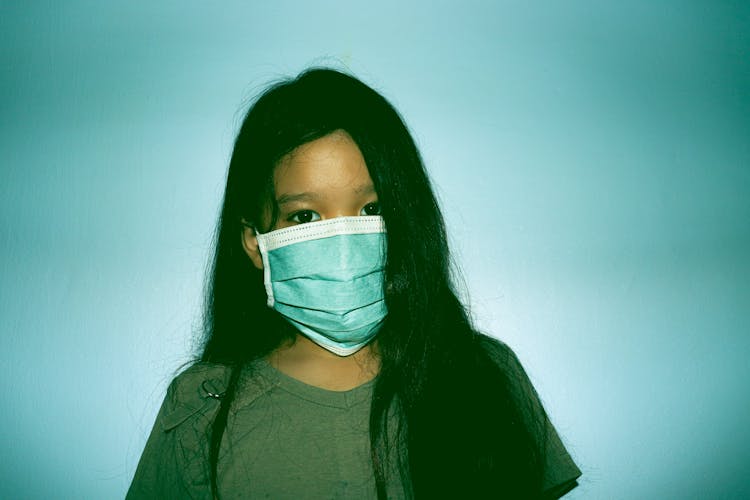 Woman In Crew Neck T-shirt Wearing Face Mask