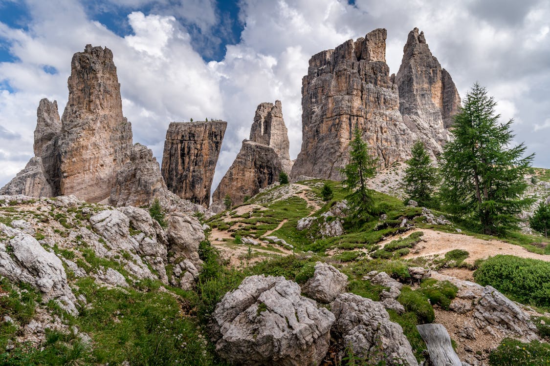 View of Rock Formation Under Cloudy Sky