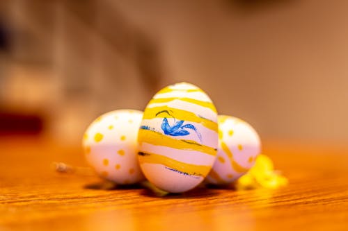 Free Three Easter Eggs on Wooden Surface Stock Photo