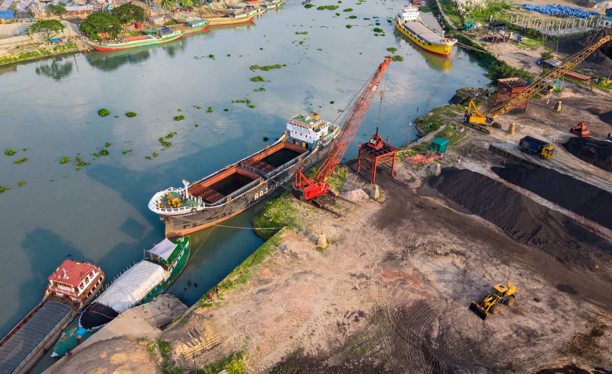 Cargo ship sailing on the Karnaphuli River in Chattogram, Bangladesh