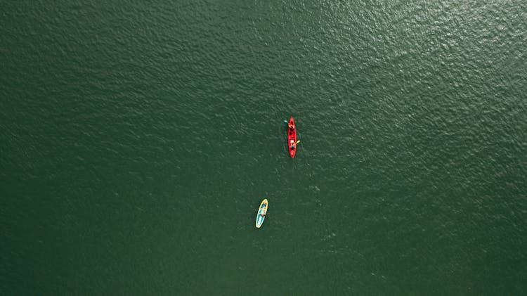 Aerial Shot Of Boats In The Middle Of The Ocean