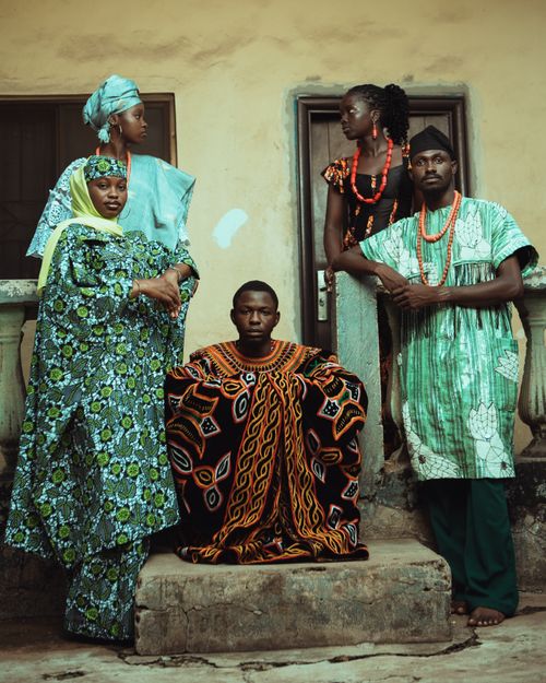 Free Group portrait showcasing vibrant traditional African clothing and cultural expressions. Stock Photo