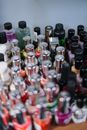 Clear Glass Bottles on Black Metal Rack