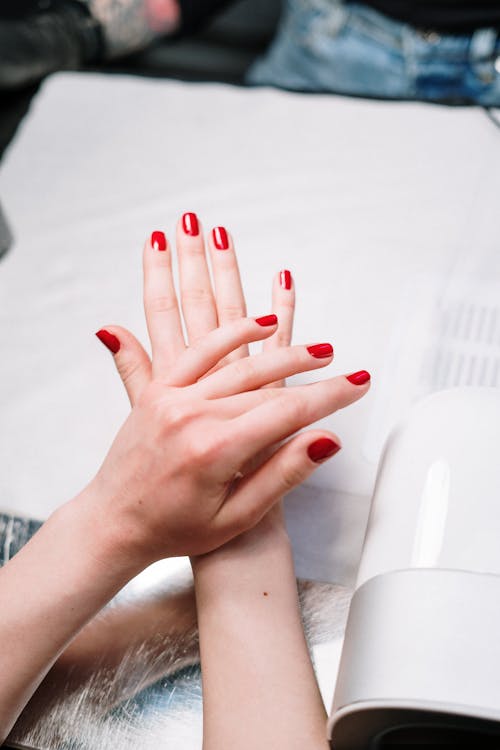 Free Person With Red Nail Polish Stock Photo