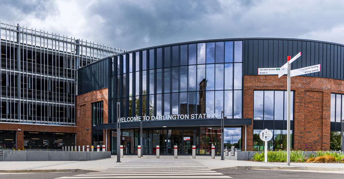 Front view of the newly designed Darlington Station under a dramatic sky.
