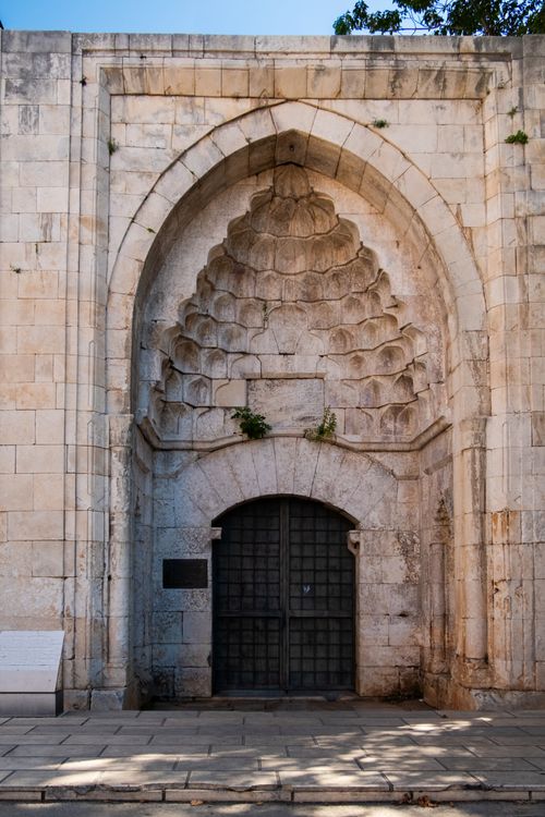 Free Ancient stone archway showcasing intricate carvings and architectural elegance. Stock Photo