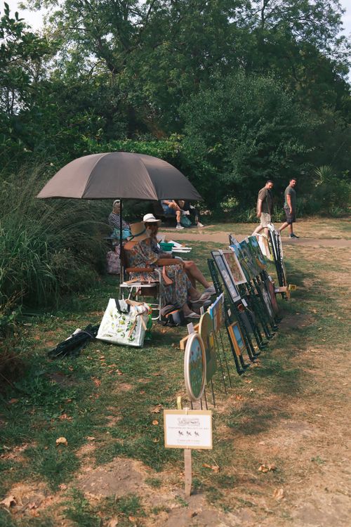Free Charming outdoor craft fair featuring art displays and leisure shopping. Stock Photo