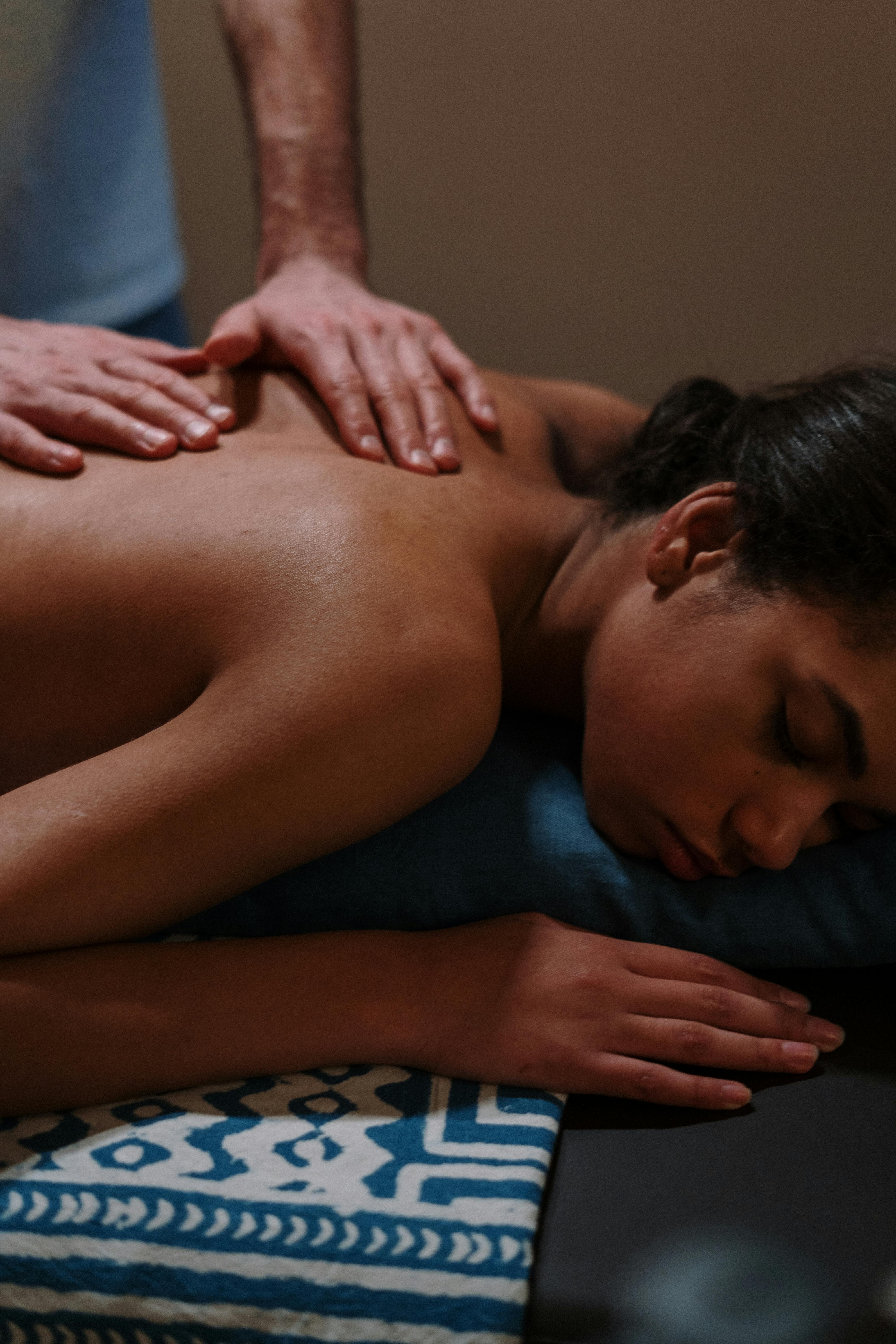 woman lying on blue bed