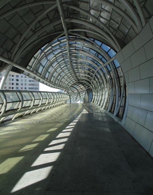 Free Modern architectural tunnel with glass and steel structure, perfect symmetry. Stock Photo
