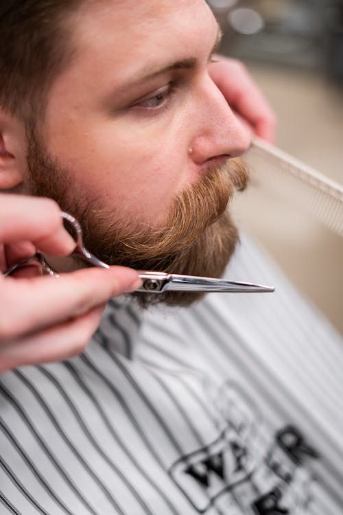 Man Getting a Beard Cut 