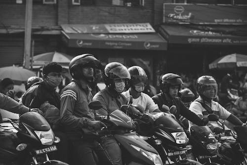 Free Grayscale Photo Of Men Riding Motorcycles Stock Photo