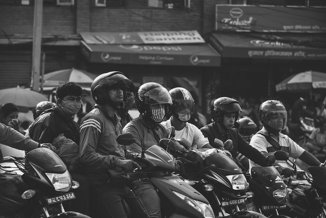 Free Grayscale Photo Of Men Riding Motorcycles Stock Photo
