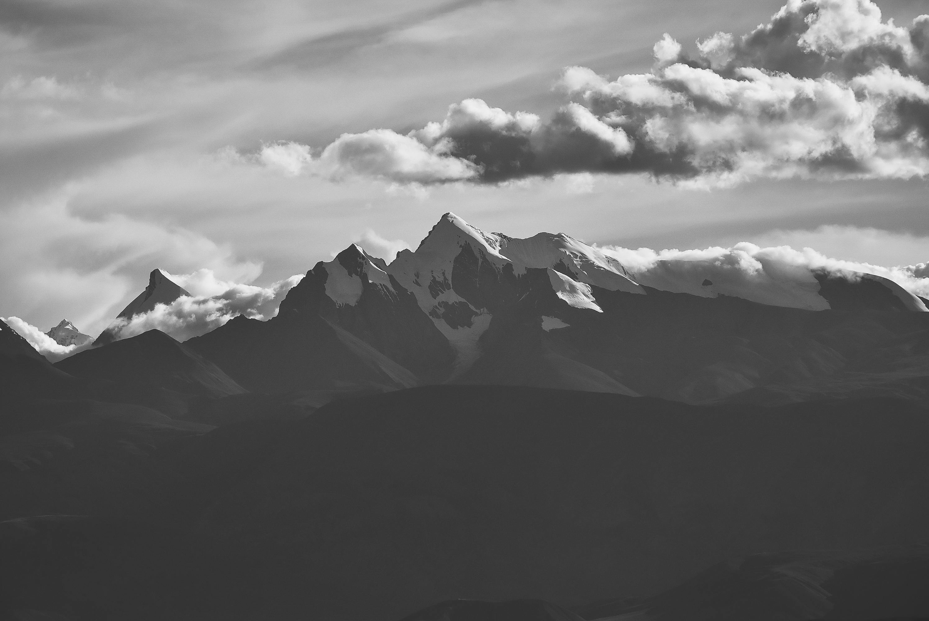 grayscale photo of snowcapped mountain