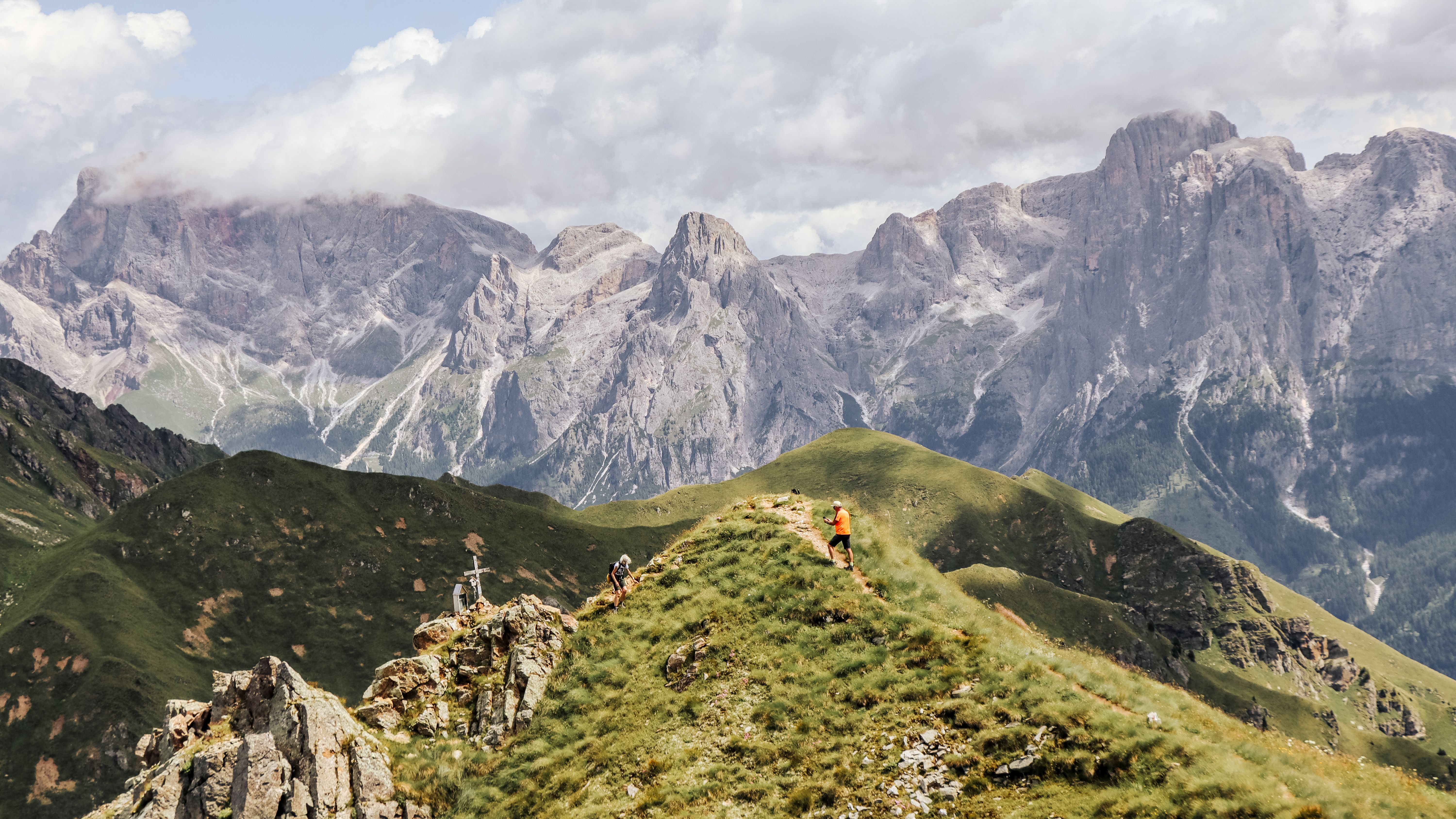 hiker navigating mountain trail wilderness