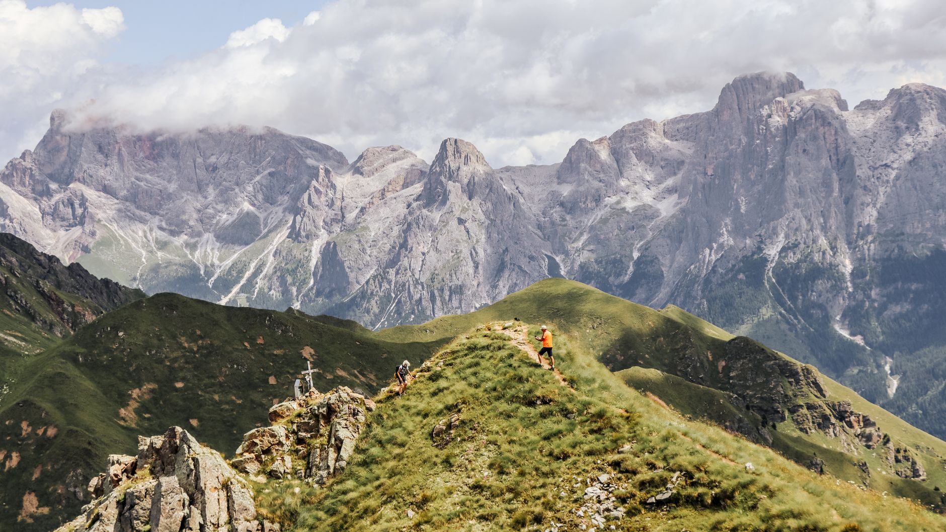 hiker navigating mountain trail wilderness