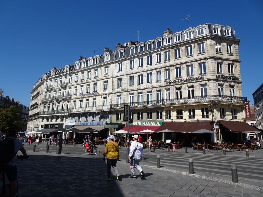 Captivating urban scene of Lille, France, showcasing classic architecture under a clear summer sky.