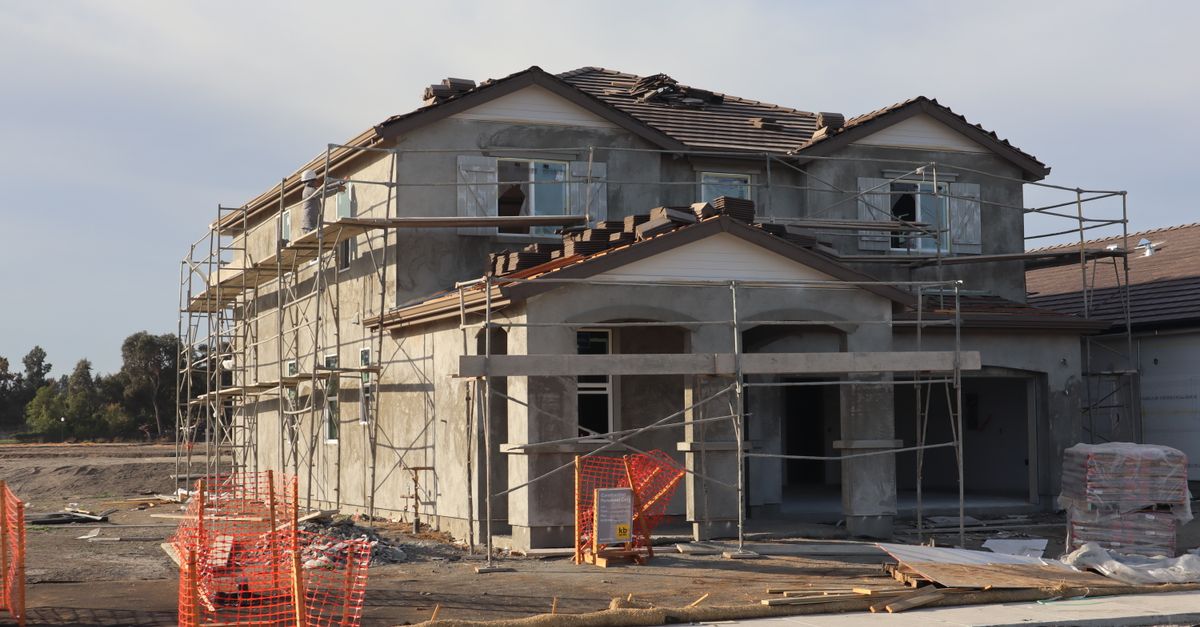 Wood framing on a Canadian house under construction, showing rising residential building costs in 2025