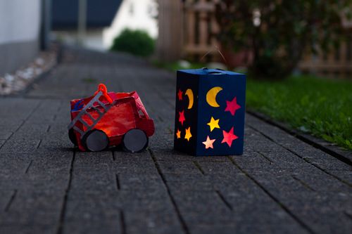 Free Colorful paper lanterns illuminate a fall evening path, evoking warmth and tradition. Stock Photo