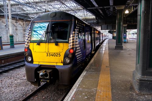 Free Scotrail train 334025 at a station platform in Edinburgh, Scotland. Stock Photo