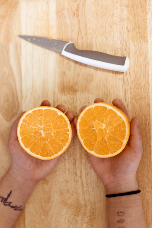 Безкоштовне стокове фото на тему «апельсин, їжа, ніж»