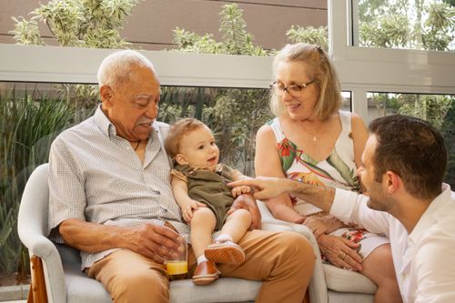 Free A joyful multigenerational family spending quality time together indoors. Stock Photo
