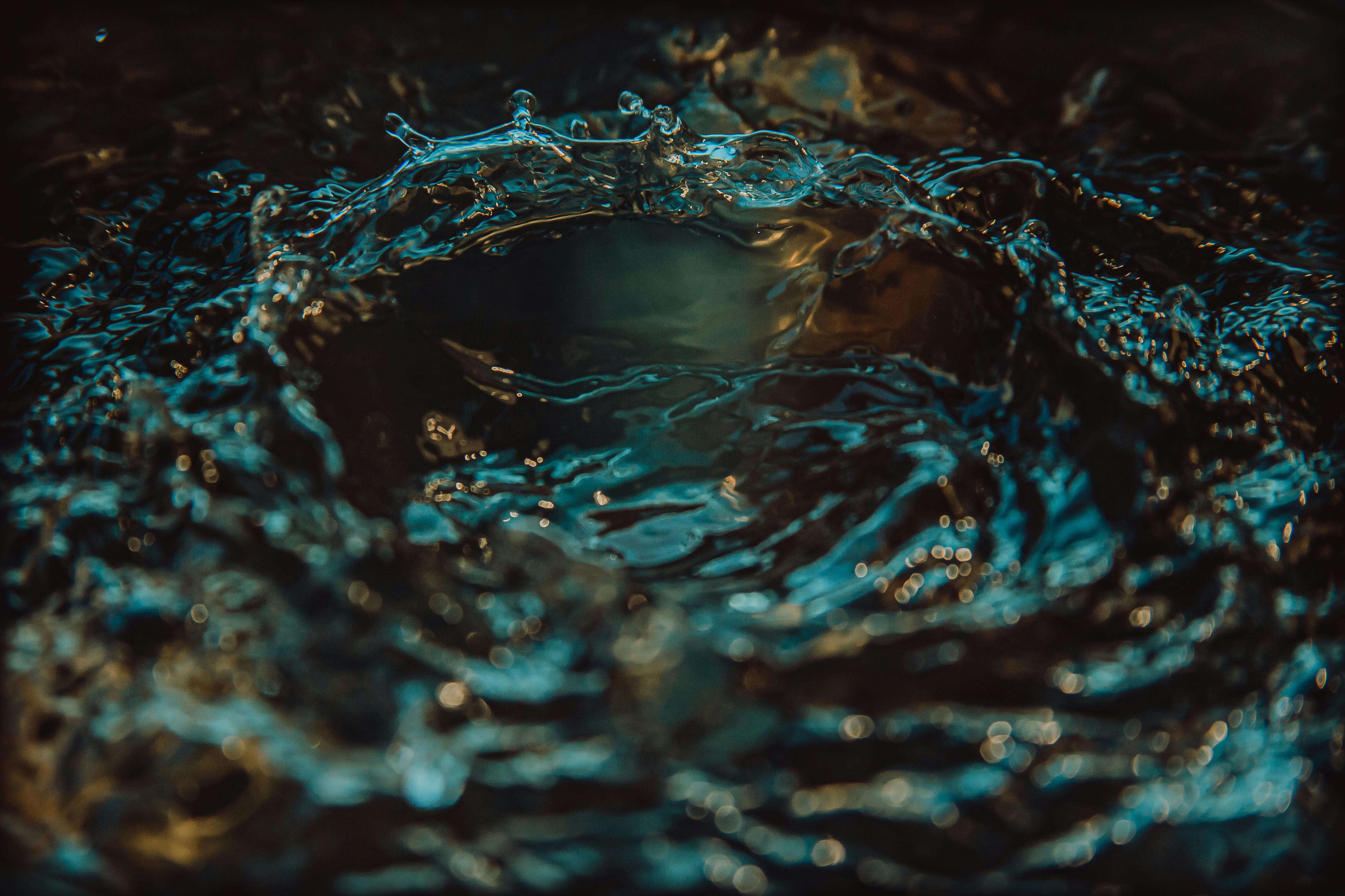 A captivating close-up shot of water ripples creating a mesmerizing pattern.