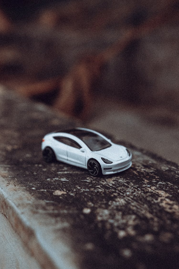 Modern Toy Car On Shabby Surface