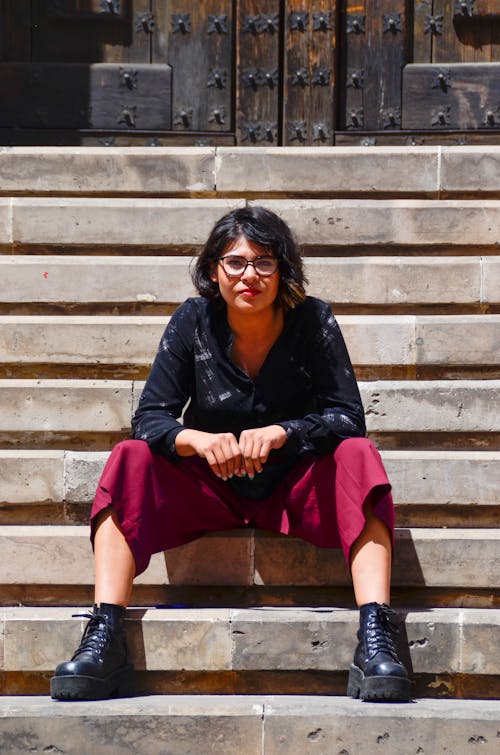 Woman Sitting On The Stairs