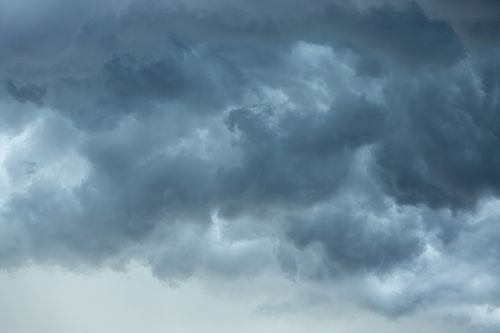 Free Dark storm clouds forming over Campbelltown, New South Wales, creating a dramatic sky. Stock Photo