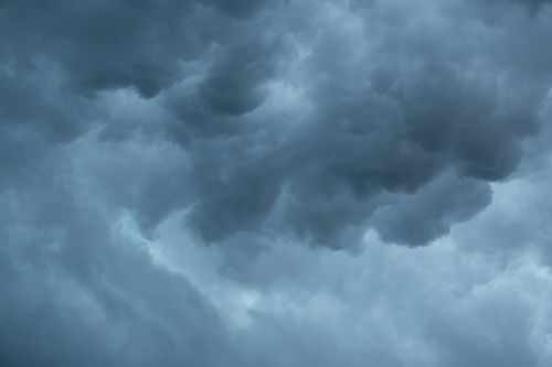 Free Moody gray storm clouds gather over Campbelltown, capturing the intense pre-rain atmosphere. Stock Photo