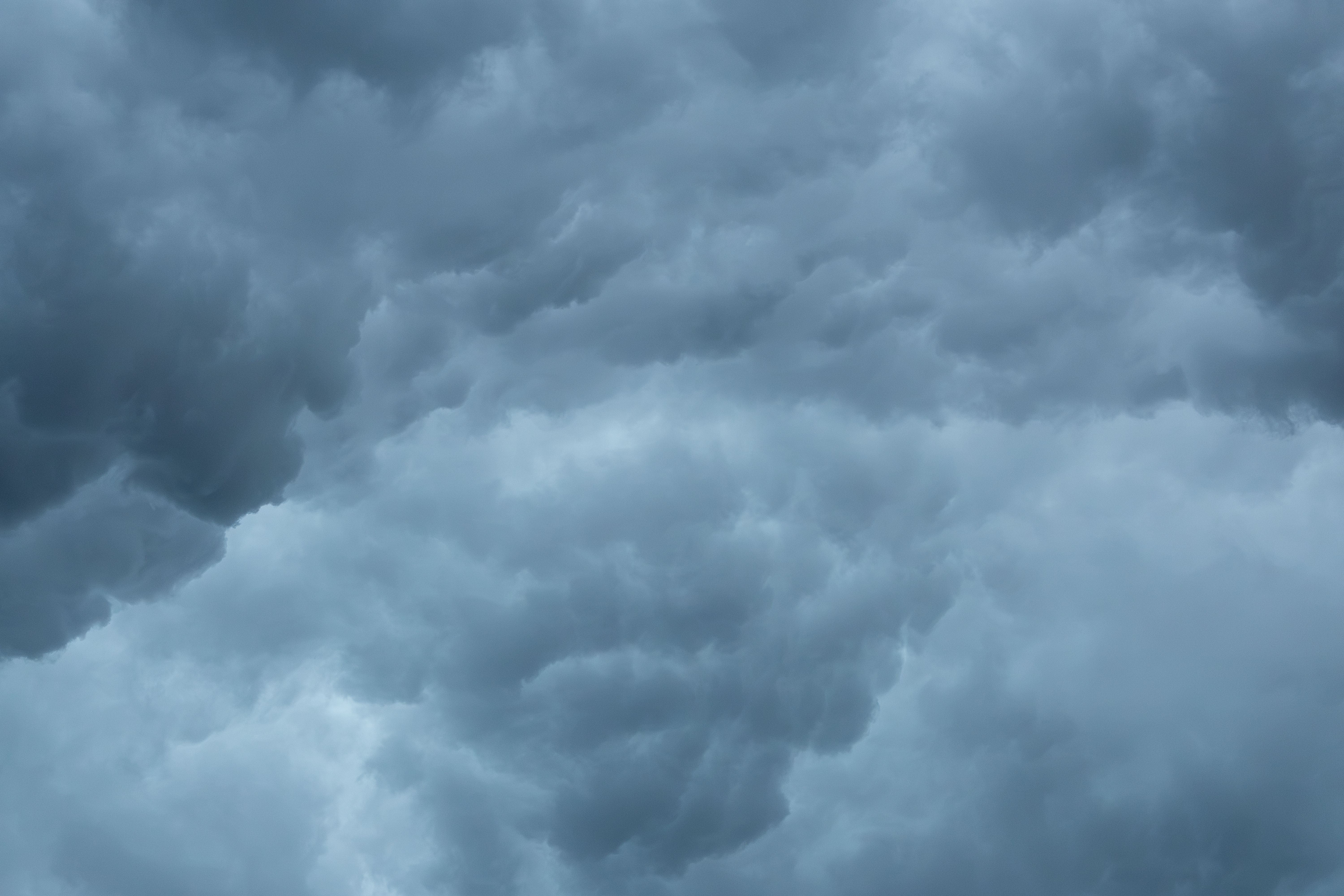 Moody clouds gathering in the sky over Campbelltown, NSW, capturing the essence of an approaching storm.
