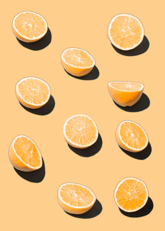 Free Illustration of bright similar cut oranges Stock Photo