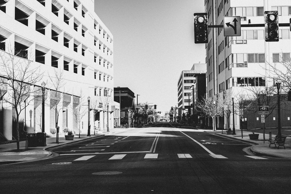 Empty street scene in downtown Boise, featuring architecture and urban elements.