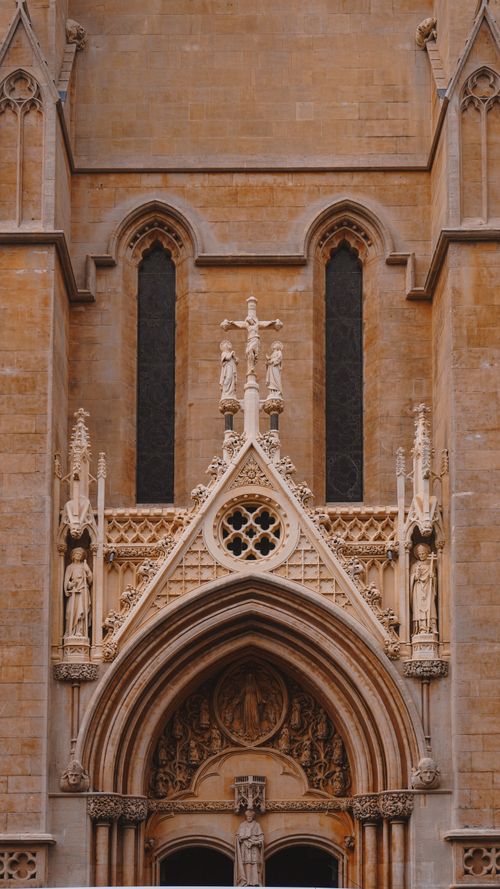 Free Intricate Gothic facade of a historic church in Cambridge, England. Stock Photo