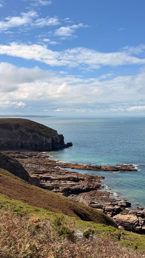 Free Explore the rugged beauty of Bretagne's coastal cliffs under a clear blue sky. Stock Photo
