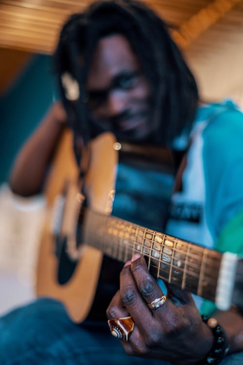 Free Man Holding A Guitar Stock Photo