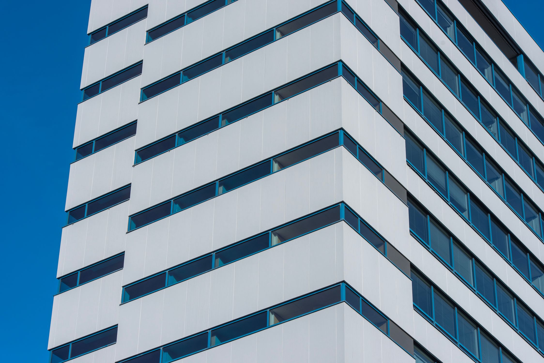 High View Window Modern High-Rise Building with Blue Windows · Free Stock Photo