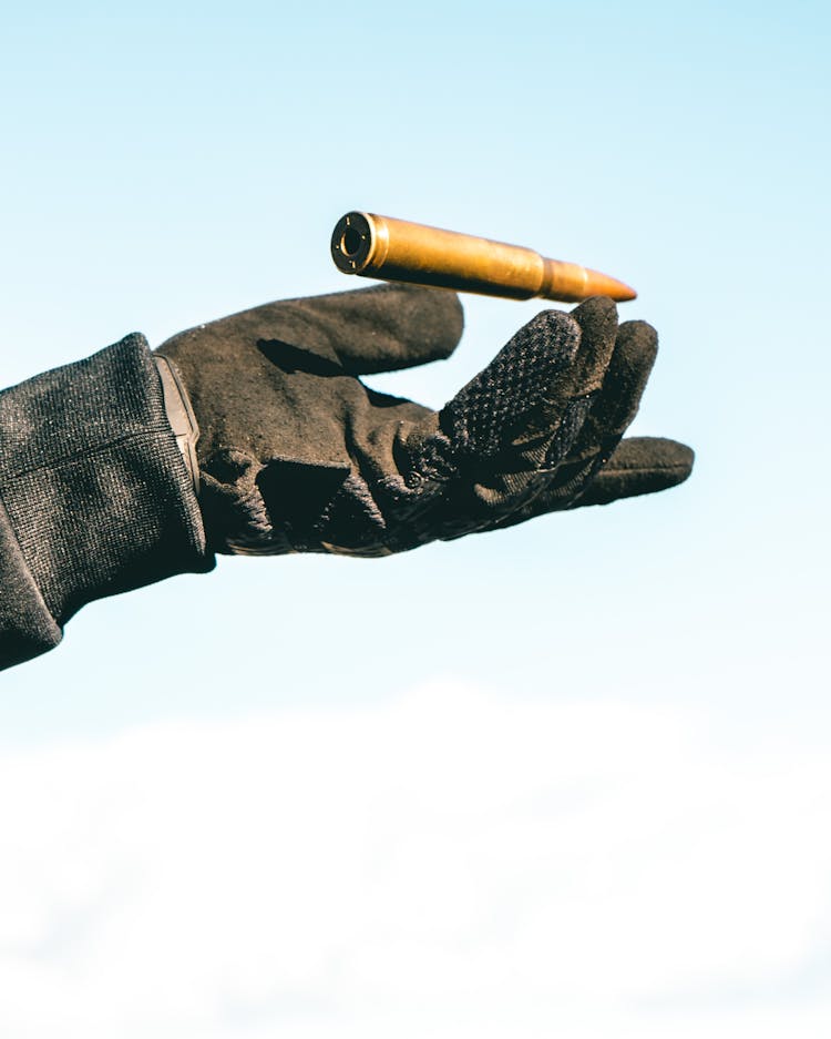 Crop Man With Cartridge On Hand