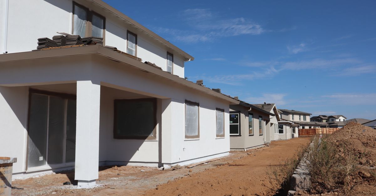 Modern suburban residential houses under construction, promising new living space.