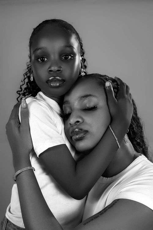 Free Heartwarming black and white portrait of a mother and child embracing. Stock Photo