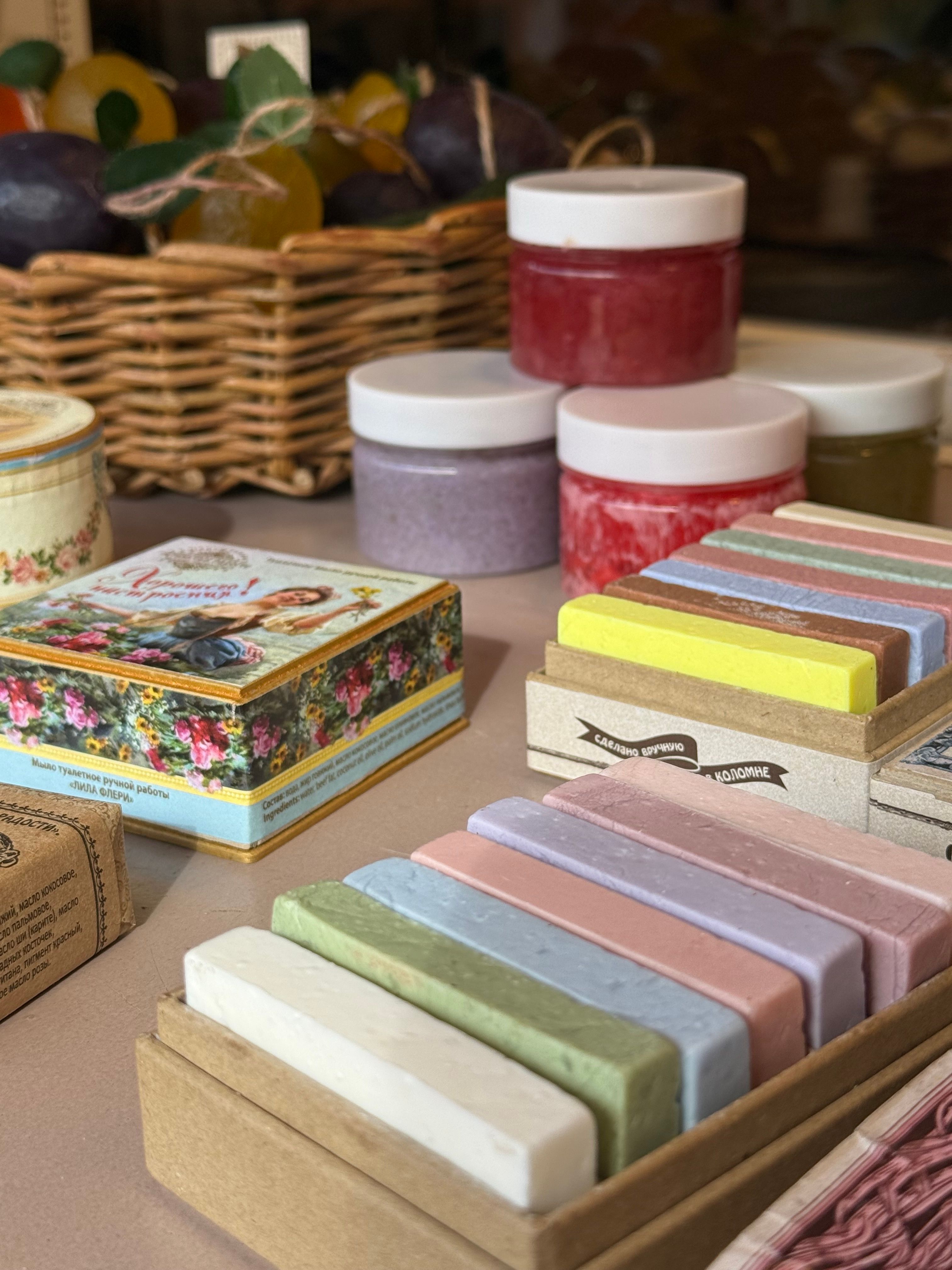 Vibrant array of handmade soaps and bath products in a boutique setting.