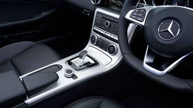 High-quality photo of a sophisticated Mercedes Benz interior showcasing premium design and details.
