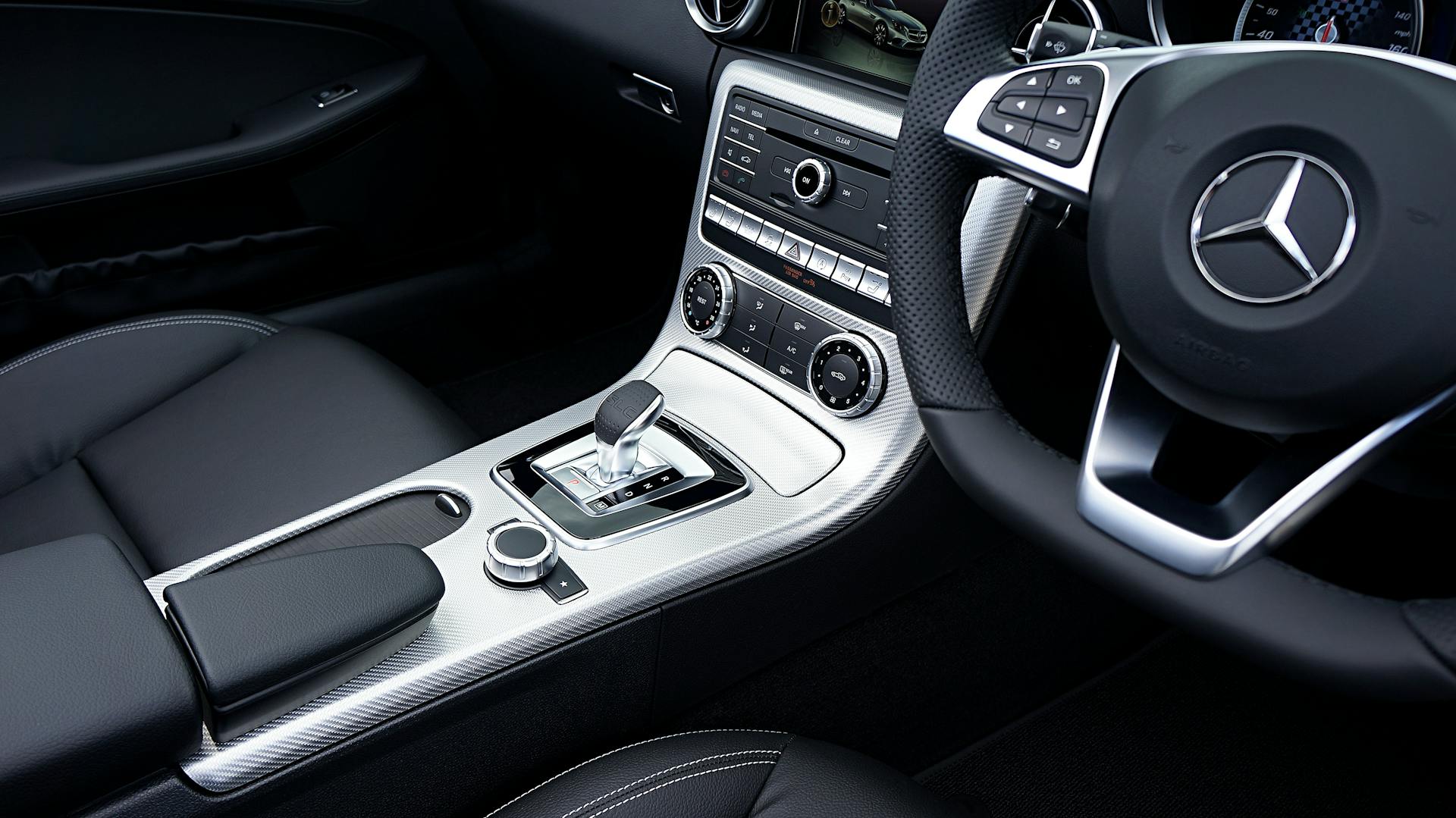 High-quality photo of a sophisticated Mercedes Benz interior showcasing premium design and details.