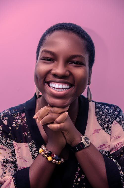 Smiling Woman In A Floral Shirt