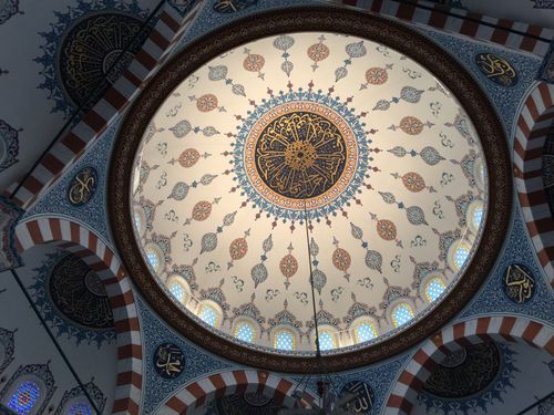 Free Stunning interior view of the Tokyo Camii Mosque dome with intricate Islamic patterns. Stock Photo
