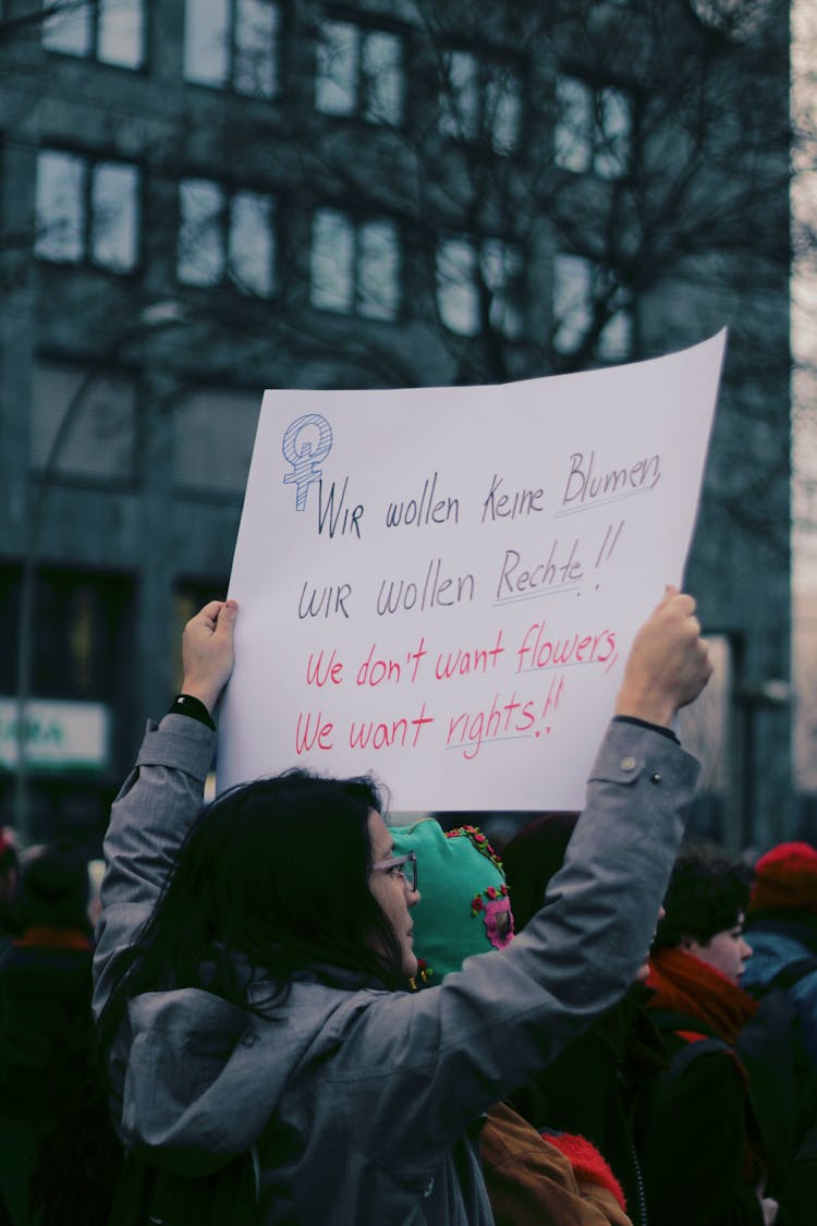 Woman Holding A Placard On Human Rights